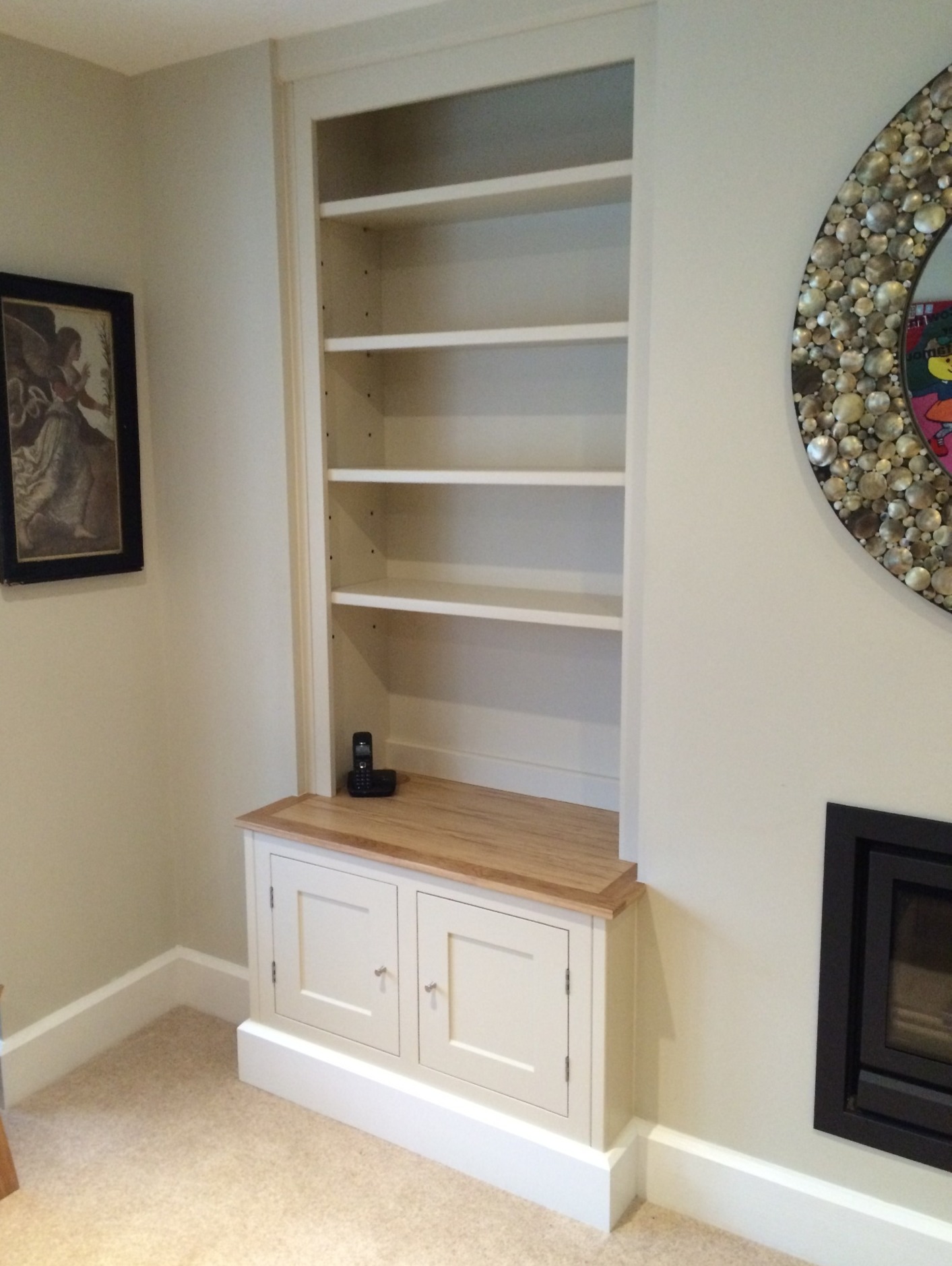 Built-alcove shelving and cupboard